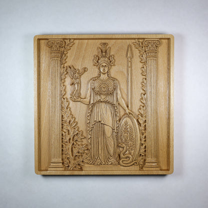 Front view of an Athena wood relief showing the Greek goddess with helmet, spear, shield, owl, olive branches, and classical carved details.