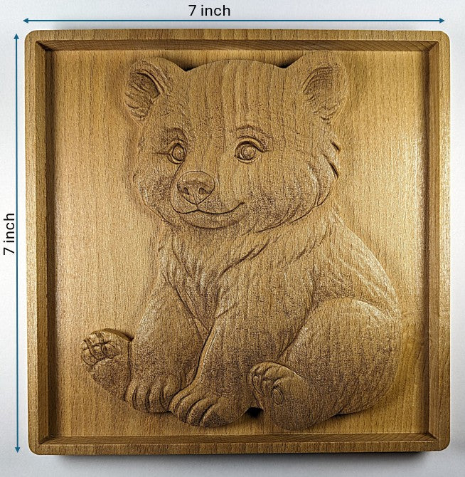 Dimensions of bear cub engraving showing length 7 inches and width 7 inches