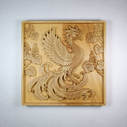 Front view of a Japanese Phoenix wood relief showing the Hoo bird, paulownia branches, carved feathers, square frame, and natural wood finish.