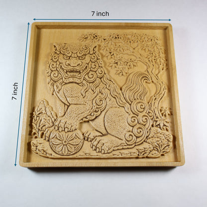 Japanese Komainu wood relief shown with 7 inch width and height markers, featuring a carved guardian lion dog, floral ball, maple tree, and natural wood finish.