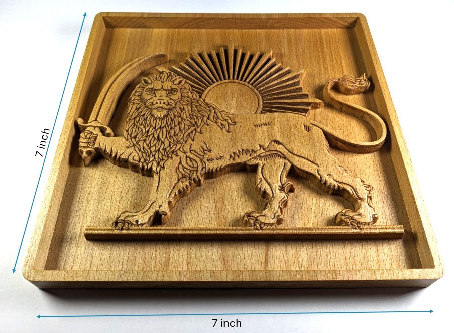 Lion and Sun wood wall art size reference showing a 7 inch by 7 inch square carved plaque with raised lion, curved saber, sunburst rays, framed wood border, visible thickness, and 3D relief depth.
