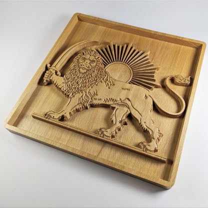 Angled view of Lion and Sun wood wall art carved in solid beech, showing raised lion, saber, radiant sunburst, curled tail, recessed square frame, warm wood grain, and 3D Persian carved wood relief depth.