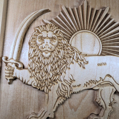 Macro close-up of Lion and Sun (Shir va Khorshid) hard maple wood relief, showing laser-engraved lion face, flowing mane, curved saber grip, and fine line detail on raised carved wood surface