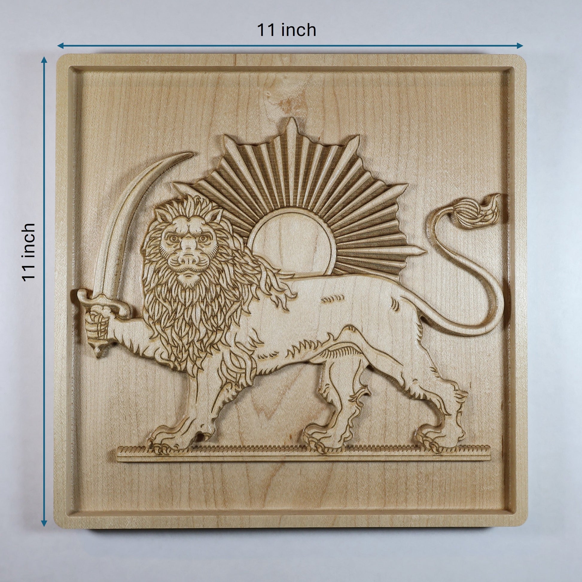 11 by 11 inch Lion and Sun wood relief size guide showing the crowned lion, sword, radiant sun, and solid hard maple panel.