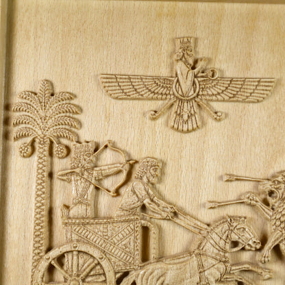 Close front view of the Royal Seal of Darius carving with the chariot hunt, royal figures, palm trees, winged emblem, and natural wood texture.