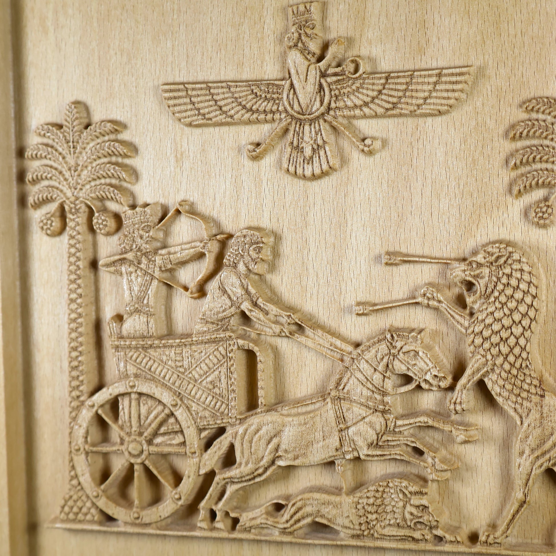 Detailed view of the Achaemenid hunting scene showing the king, bowman, driver, horses, lions, date palms, and winged symbol.