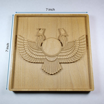 Egyptian Winged Sun Disk wood relief with 7 inch width and height markers, showing the central sun disk, twin cobras, feathered wings, square frame, and natural beech wood finish.