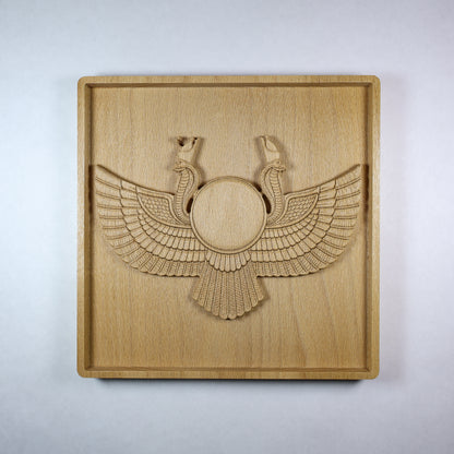 Front view of an Egyptian Winged Sun Disk wood relief with carved wings, mirrored cobra details, a central sun disk, square frame, and natural beech wood finish.