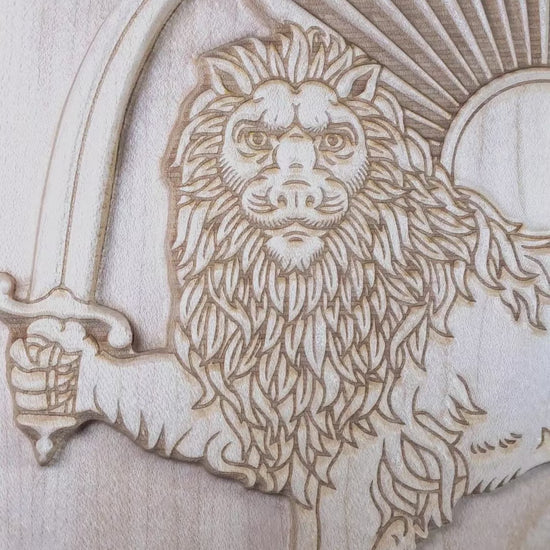 Video of Lion and Sun (Shir va Khorshid) hard maple wood relief rotating side to side, showing 3D carved depth, raised lion figure, curved saber, sunburst rays, and laser-engraved detail, Persian wall art